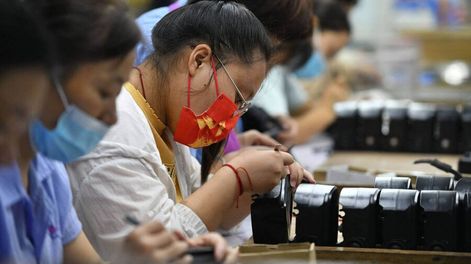 Búsqueda | Trabajadoras chinas. Foto: AFP