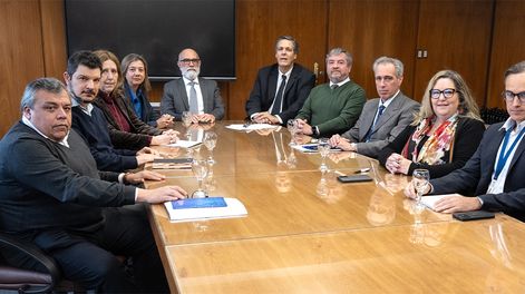 Adolfo Sarmiento, el primero a la izquierda, en su último Copom, en julio