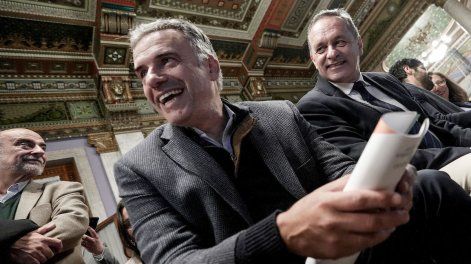 Yamandú Orsi y Álvaro Delgado