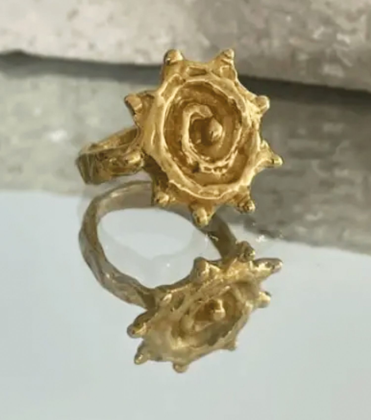 Anillo con forma de sol