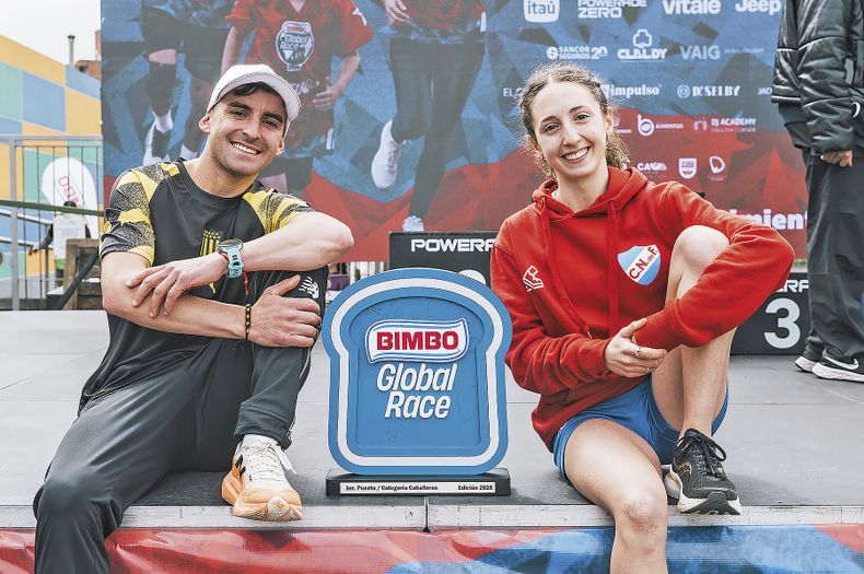 Ganadores de la carrera Óscar Cáceres y Julieta Firpo.