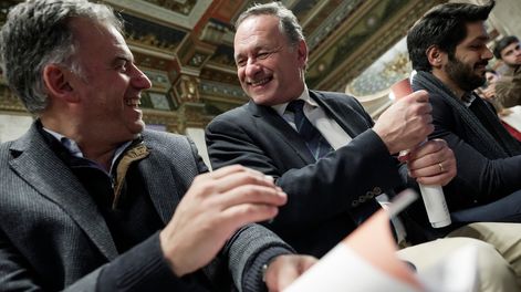 Yamandú Orsi y Álvaro Delgado durante una actividad en el Parlamento