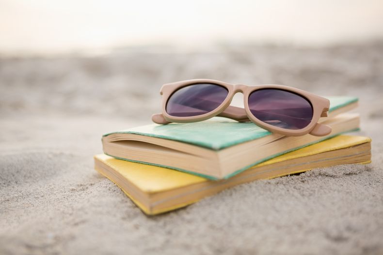 sunglasses-books-sand.jpg