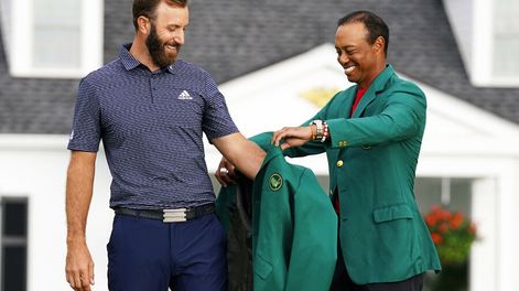 Dustin Johnson y Tiger Woods