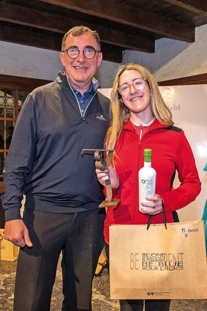 Celmar y Ana  Évora, ganadora del mejor score gross