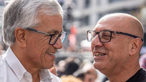 El ministro Castillo y el presidente del PIT-CNT en el acto por el Día de los Trabajadores